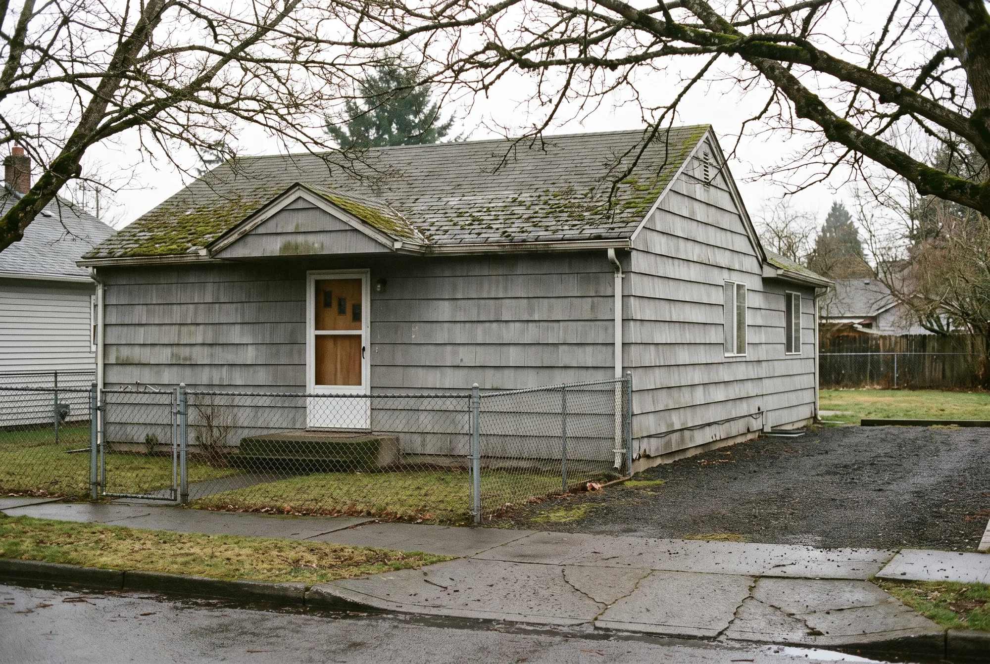 Illustration: the front of a rented single-family house, the kind of home owners sell with tenants still living in it